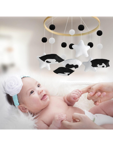 Móvil Montessori para cuna TINITIGIES - Estimulación visual 34x16cm Móvil Montessori para cuna TINITIGIES - Estimulación visual 34x16cm