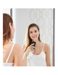 Irrigador Oral Inalámbrico KUSKER con 3 Modos y 4 Boquillas 2