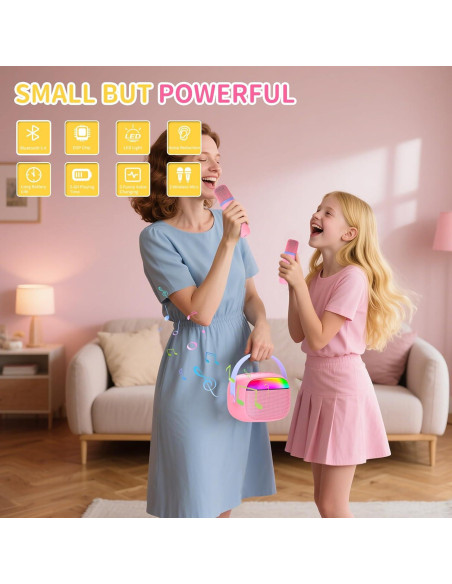 Mini Máquina de Karaoke Rosa Hengchuang con 2 Micrófonos Inalámbricos