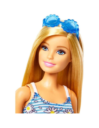 Muñeca Barbie con 4 looks y accesorios de moda Mattel
