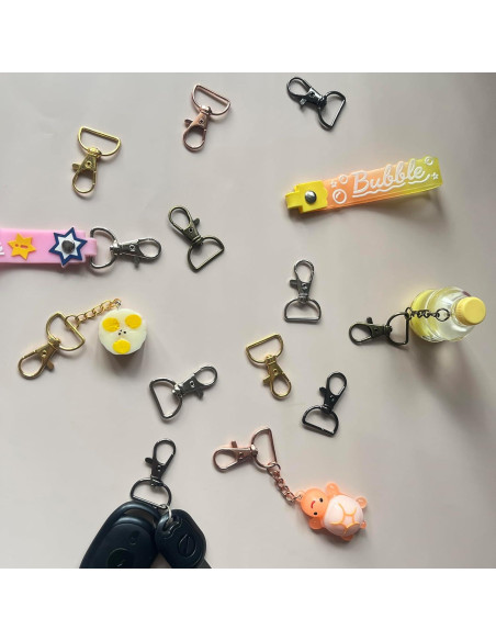 50 Ganchos de Cierre Giratorios Segauin 2.54 cm Dorado