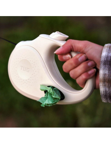Correa Retráctil para Perros TUG Oval 4.88m con Dispensador Crema