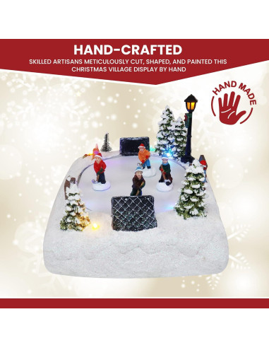 Pista de Patinaje de Hockey Top Treasures - Pueblo Navideño Musical