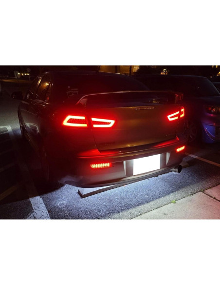 Luces Reflectoras LED Parachoques iJDMTOY Ahumadas para Mitsubishi