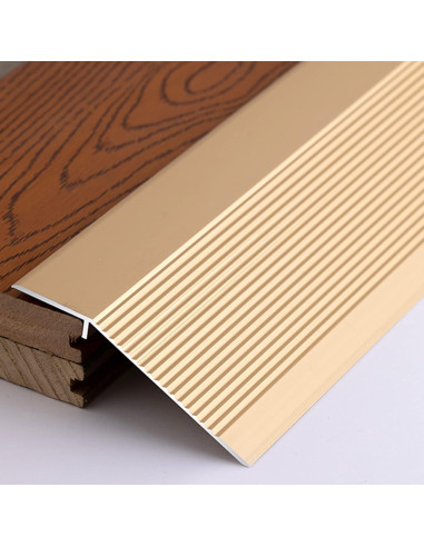 Tira de transición de suelo Dntum 90cm dorada aluminio
